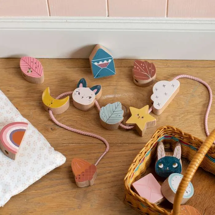 Jeu-de-perles-en-bois-à-enfiler-Après-la-pluie-Moulin-Roty Promotion Saisonnière Jeu de perles en bois à enfiler Après la pluie Moulin Roty
