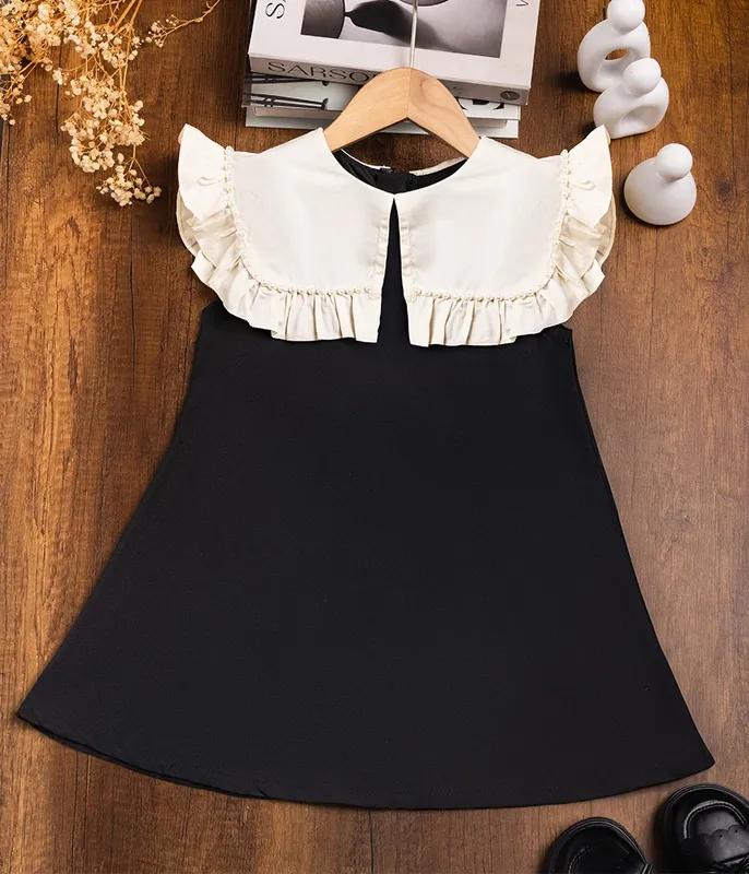 Robe-classique-noir-à-gros-revers-style-chanel-12072 Robe classique noir à gros revers style chanel Promotion