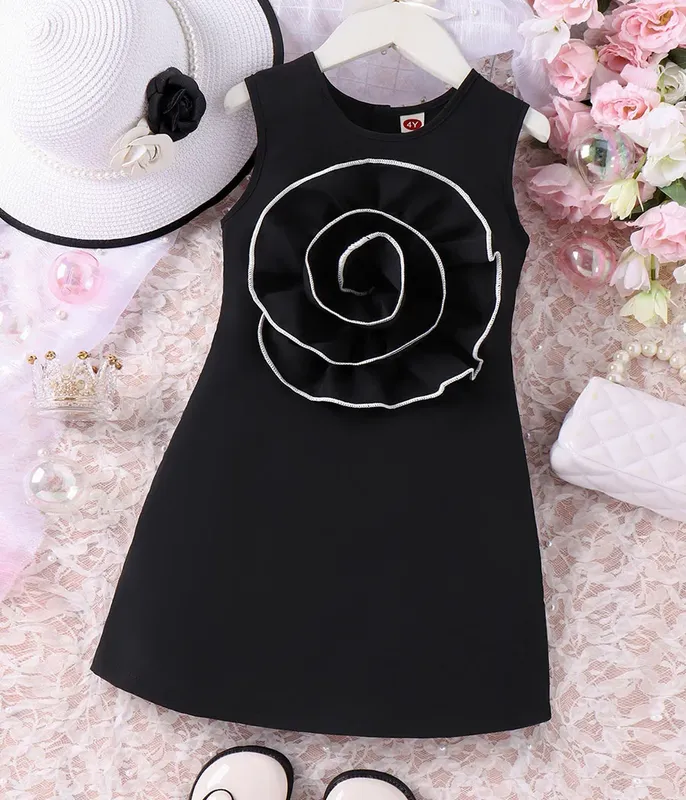 Robe-noire-près-du-corps-à-fleur-fantaisie-au-centre-12174 Robe noire près du corps à fleur fantaisie au centre Prix Choc